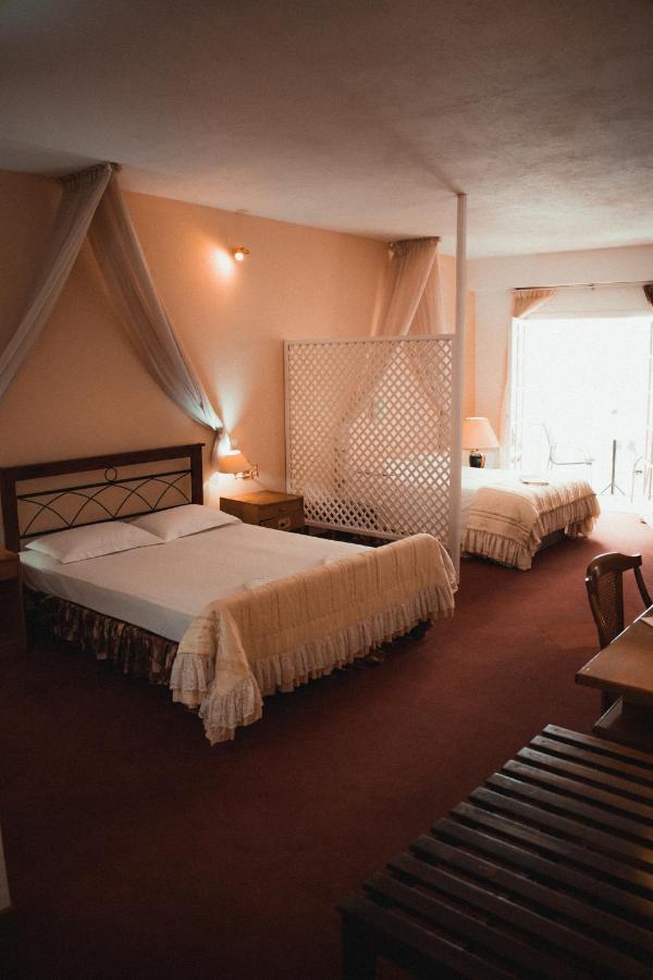 Junior Suite mit Poolblick (4 Erwachsene)
